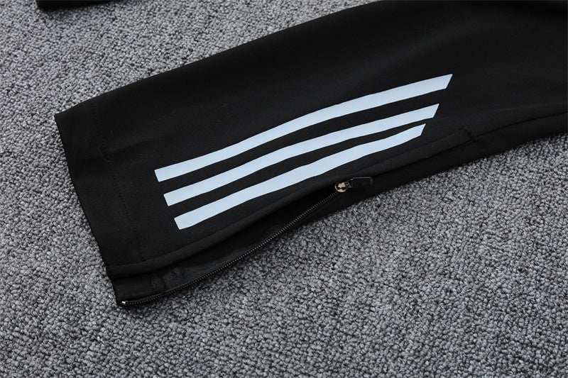 Buzo Completo Real Madrid Diseño Blanco y Naranja