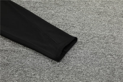 Buzo Completo Manchester United Negro Blanco