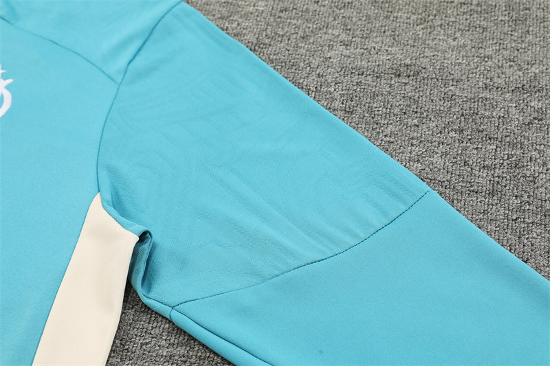 Buzo Completo Marsella Cyan Blanco