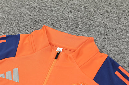 Buzo Completo Manchester United Naranja Azul