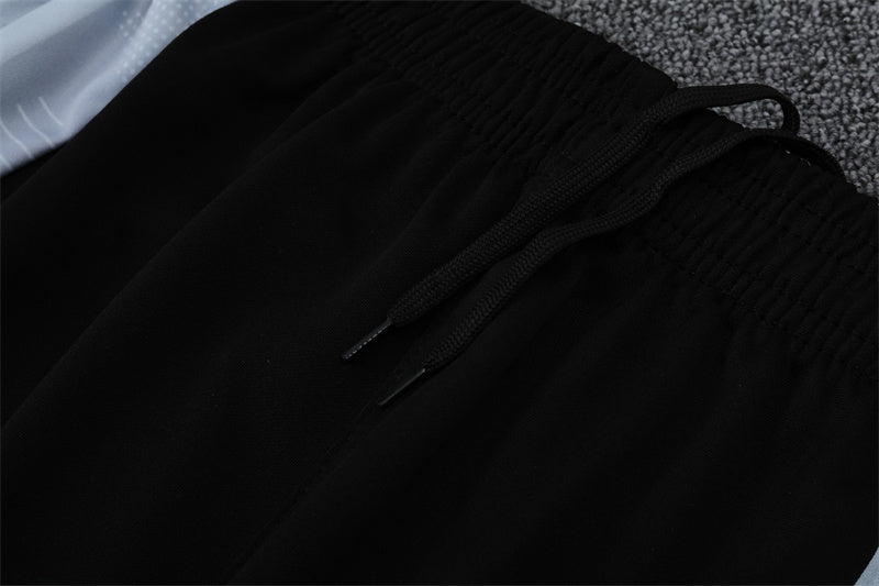 Buzo Completo Real Madrid Diseño Blanco y Naranja