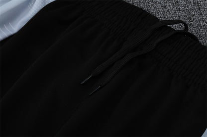 Buzo Completo Real Madrid Diseño Blanco y Naranja