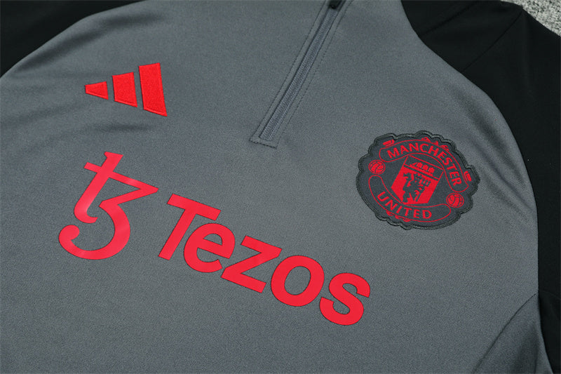 Buzo Completo con Cierre Manchester United Gris Diseño Rojo