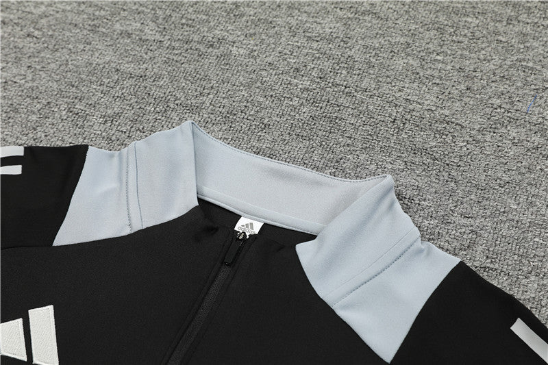 Buzo Completo Manchester United Negro Blanco