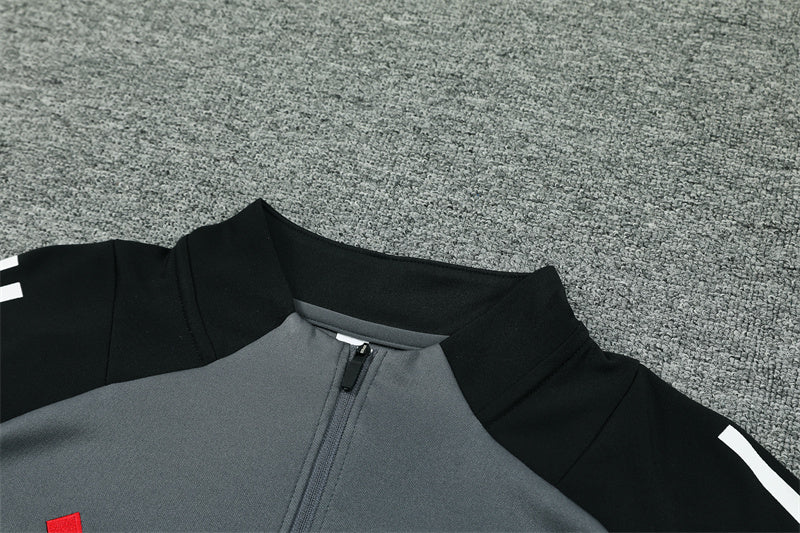 Buzo Completo con Cierre Manchester United Gris Diseño Rojo