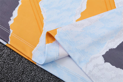 Buzo Completo Real Madrid Diseño Blanco y Naranja