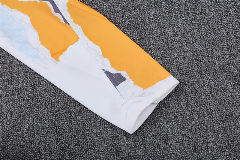 Buzo Completo Real Madrid Diseño Blanco y Naranja