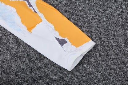 Buzo Completo Real Madrid Diseño Blanco y Naranja