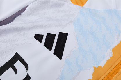 Buzo Completo Real Madrid Diseño Blanco y Naranja