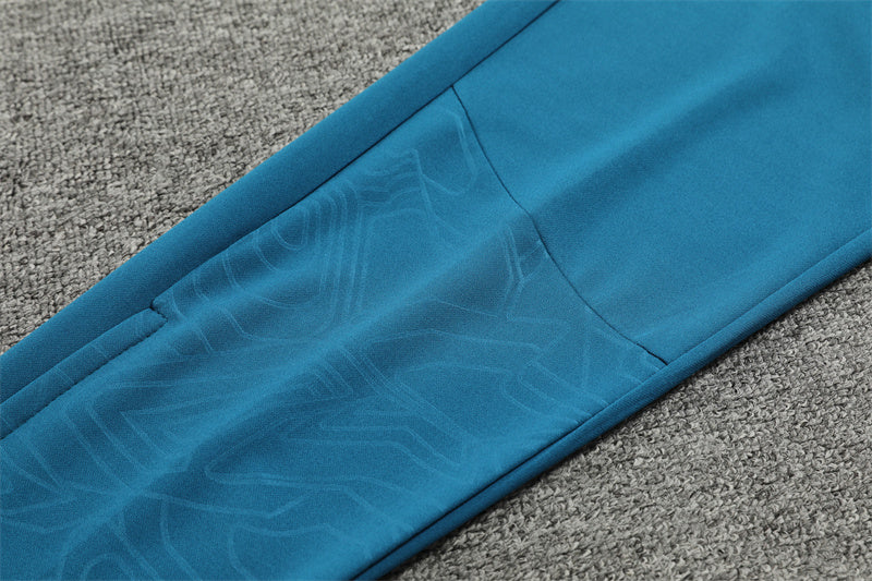 Buzo Completo Marsella Cyan Blanco