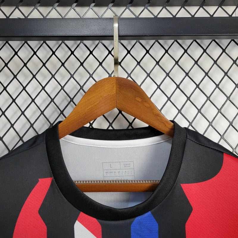 Camiseta Manchester United Entrenamiento Roja y Azul 2024/25 Versión Fan