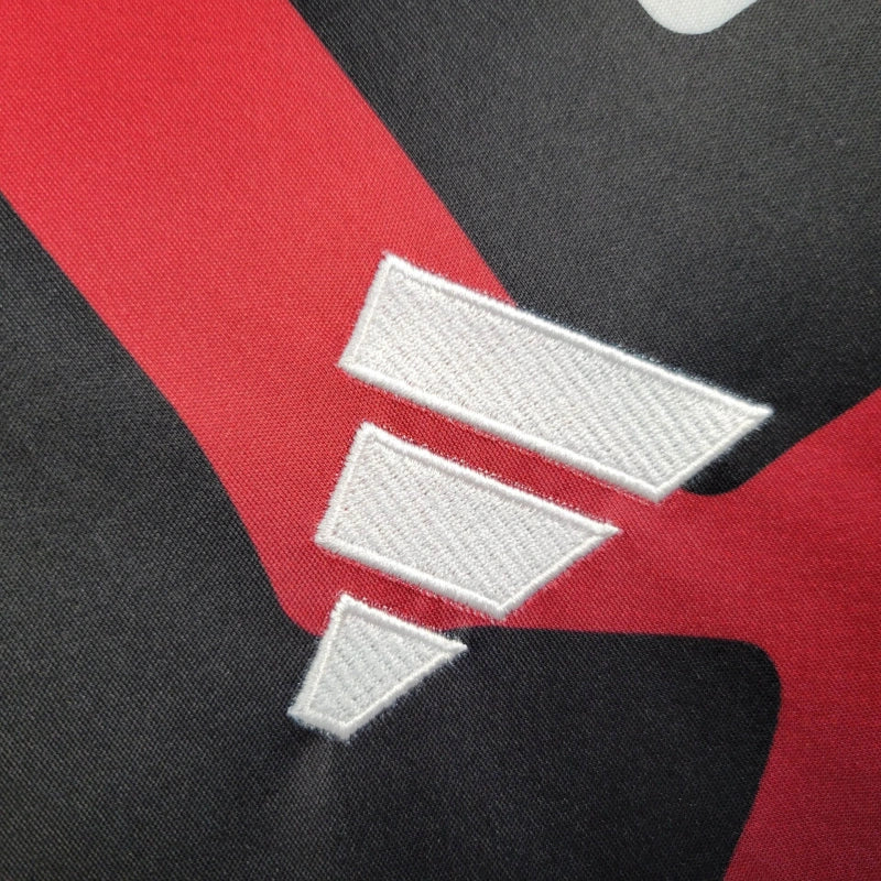 Camiseta Manchester United Entrenamiento Roja y Azul 2024/25 Versión Fan