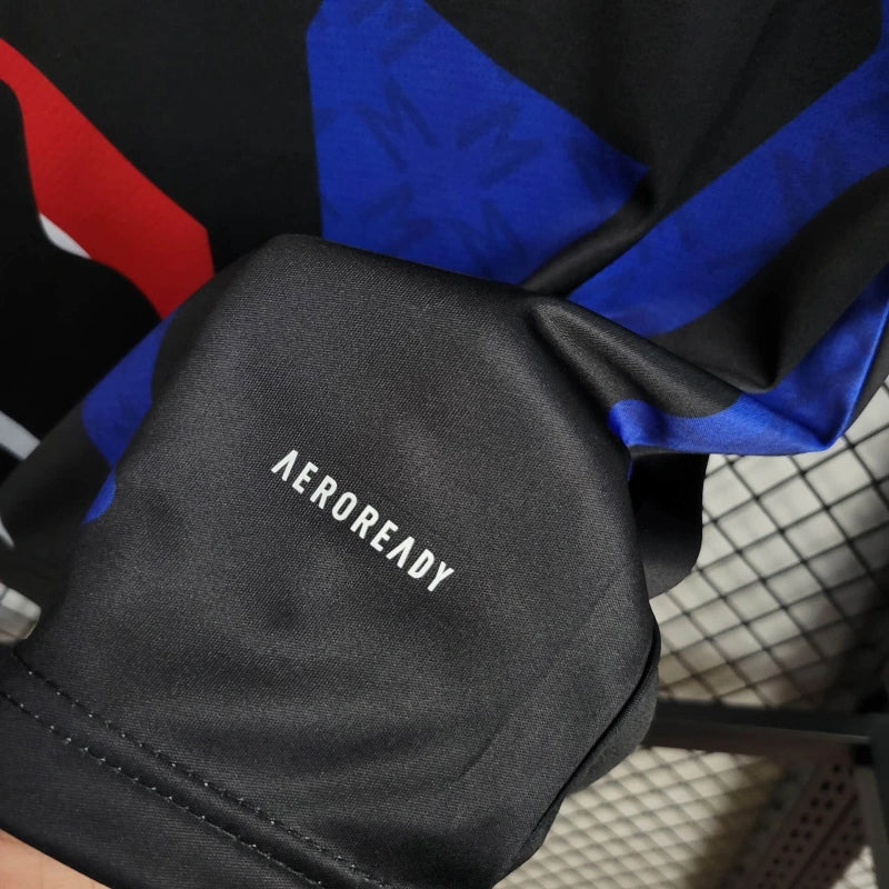 Camiseta Manchester United Entrenamiento Roja y Azul 2024/25 Versión Fan