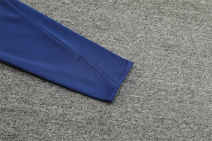 Buzo Completo Manchester United Naranja Azul