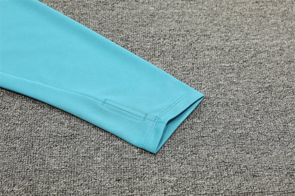 Buzo Completo Marsella Cyan Blanco