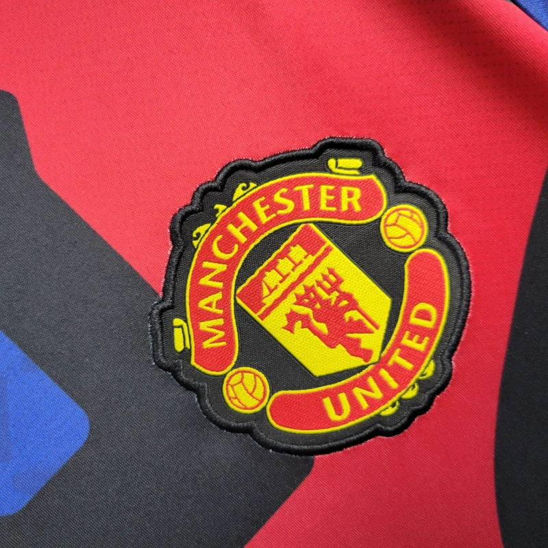 Camiseta Manchester United Entrenamiento Roja y Azul 2024/25 Versión Fan