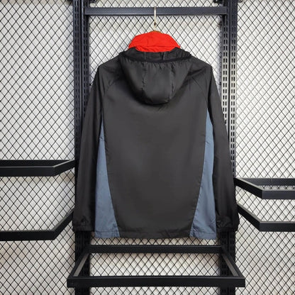 Cortavientos Manchester United Negro/Rojo 2023/24