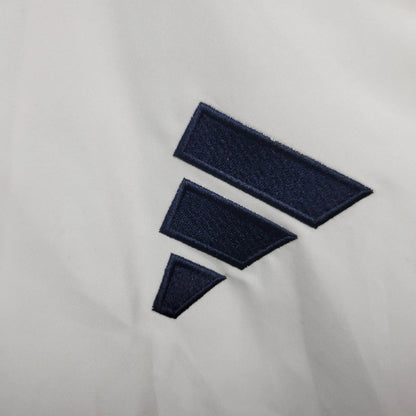 Cortavientos Manchester United Blanco/Burdeos 2023